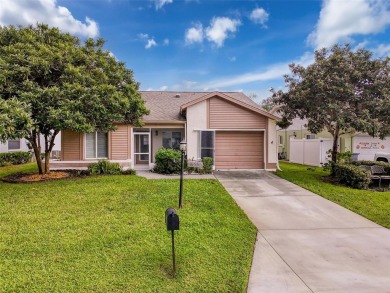 Lovely 2 bedroom home with split bedrooms, vaulted ceilings in on Summertree Golf Course in Florida - for sale on GolfHomes.com, golf home, golf lot