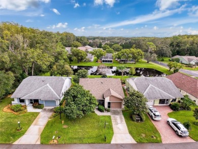 Lovely 2 bedroom home with split bedrooms, vaulted ceilings in on Summertree Golf Course in Florida - for sale on GolfHomes.com, golf home, golf lot