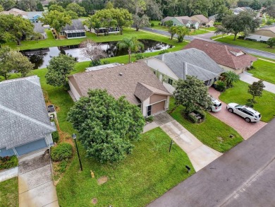 Lovely 2 bedroom home with split bedrooms, vaulted ceilings in on Summertree Golf Course in Florida - for sale on GolfHomes.com, golf home, golf lot