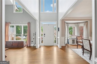 Welcome to 504 West Green Court-an exquisitely  renovated home on Towne Lake Hills Golf Club in Georgia - for sale on GolfHomes.com, golf home, golf lot
