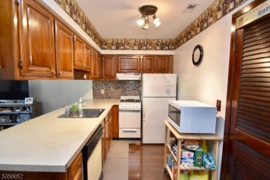 Tucked into a quiet corner of Great Gorge Village just minutes on Minerals Golf Club in New Jersey - for sale on GolfHomes.com, golf home, golf lot