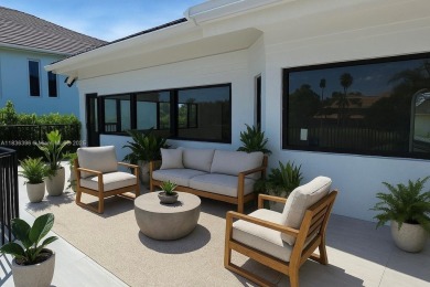 Located in Boca Grove, this charming remodel features a on Boca Grove Golf and Tennis in Florida - for sale on GolfHomes.com, golf home, golf lot