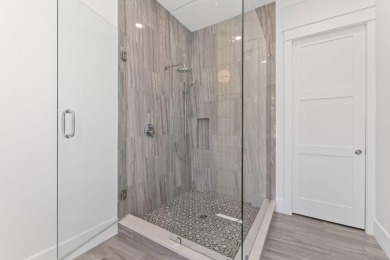 Discover this exquisite custom home on the east end of Scenic on Camp Creek Golf Course in Florida - for sale on GolfHomes.com, golf home, golf lot