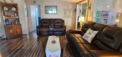 Florida fun and entertaining home with space for all your events on Zephyrhills Municipal Golf Course in Florida - for sale on GolfHomes.com, golf home, golf lot