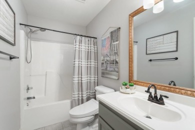 Southern charm meets this 3BR 2BA  Cape Cod style cottage tucked on Holly Lake Ranch Golf Club in Texas - for sale on GolfHomes.com, golf home, golf lot
