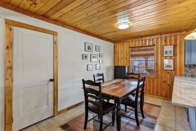 Warm, welcoming, and full of character, this log cabin style on De Cordova Bend Country Club in Texas - for sale on GolfHomes.com, golf home, golf lot