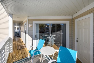 IMMACULATE, FURNISHED, AND MOVE-IN READY! Step into this on Surf Golf and Beach Club in South Carolina - for sale on GolfHomes.com, golf home, golf lot