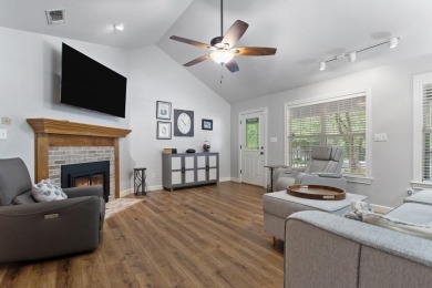 Southern charm meets this 3BR 2BA  Cape Cod style cottage tucked on Holly Lake Ranch Golf Club in Texas - for sale on GolfHomes.com, golf home, golf lot