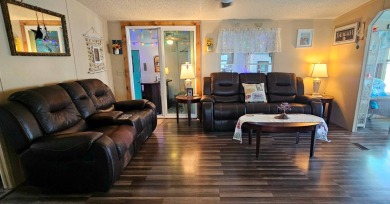 Florida fun and entertaining home with space for all your events on Zephyrhills Municipal Golf Course in Florida - for sale on GolfHomes.com, golf home, golf lot