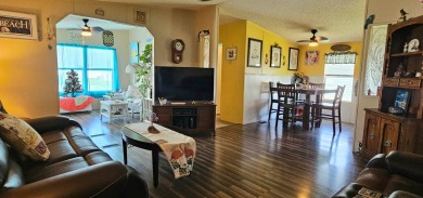 Florida fun and entertaining home with space for all your events on Zephyrhills Municipal Golf Course in Florida - for sale on GolfHomes.com, golf home, golf lot