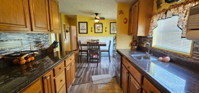 Florida fun and entertaining home with space for all your events on Zephyrhills Municipal Golf Course in Florida - for sale on GolfHomes.com, golf home, golf lot