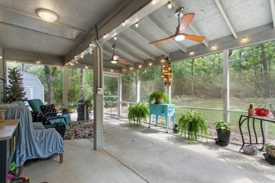 Southern charm meets this 3BR 2BA  Cape Cod style cottage tucked on Holly Lake Ranch Golf Club in Texas - for sale on GolfHomes.com, golf home, golf lot
