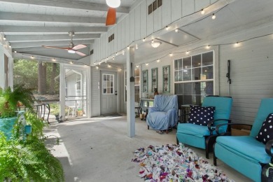 Southern charm meets this 3BR 2BA  Cape Cod style cottage tucked on Holly Lake Ranch Golf Club in Texas - for sale on GolfHomes.com, golf home, golf lot