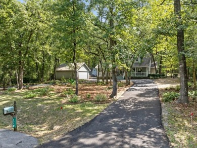 Southern charm meets this 3BR 2BA  Cape Cod style cottage tucked on Holly Lake Ranch Golf Club in Texas - for sale on GolfHomes.com, golf home, golf lot