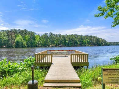 Southern charm meets this 3BR 2BA  Cape Cod style cottage tucked on Holly Lake Ranch Golf Club in Texas - for sale on GolfHomes.com, golf home, golf lot