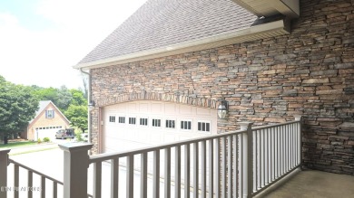 This spacious 3,380 sq ft brick and stone ranch-style home in on Royal Oaks Golf Club in Tennessee - for sale on GolfHomes.com, golf home, golf lot