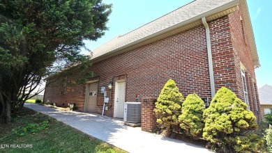 This spacious 3,380 sq ft brick and stone ranch-style home in on Royal Oaks Golf Club in Tennessee - for sale on GolfHomes.com, golf home, golf lot