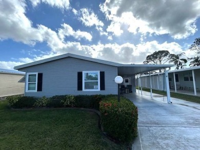 Discover this beautiful turnkey 2-bedroom, 2-bathroom home on Crystal Lake Club in Florida - for sale on GolfHomes.com, golf home, golf lot