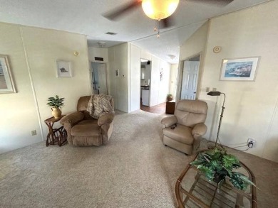 Discover this beautiful turnkey 2-bedroom, 2-bathroom home on Crystal Lake Club in Florida - for sale on GolfHomes.com, golf home, golf lot