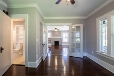 Walk in and welcome home to this Beautifully Renovated Bungalow on Alfred Tup Holmes Golf Course in Georgia - for sale on GolfHomes.com, golf home, golf lot