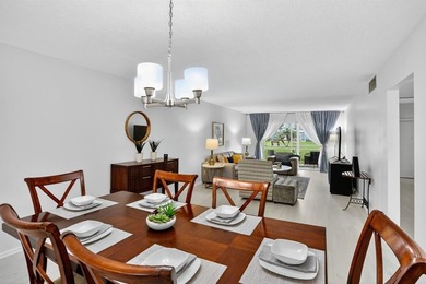 Remodeled First Floor Corner, Move in Ready Beautiful Garden on Wynmoor Golf Course in Florida - for sale on GolfHomes.com, golf home, golf lot