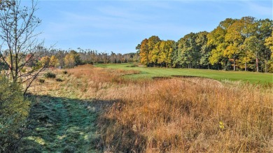 The Fairway Lodge at the Estates of Pine Glen in Saugatuck is a on Ravines Golf Club in Michigan - for sale on GolfHomes.com, golf home, golf lot