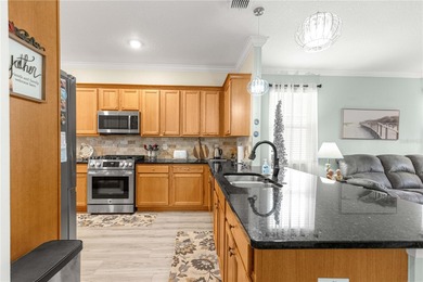 LOCATION-LOCATION-LOCATION - BACKS TO FARM/GREEN SPACE! Spacious on Candler Hills Golf and Country Club in Florida - for sale on GolfHomes.com, golf home, golf lot