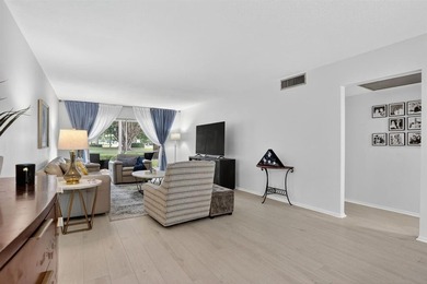 Remodeled First Floor Corner, Move in Ready Beautiful Garden on Wynmoor Golf Course in Florida - for sale on GolfHomes.com, golf home, golf lot