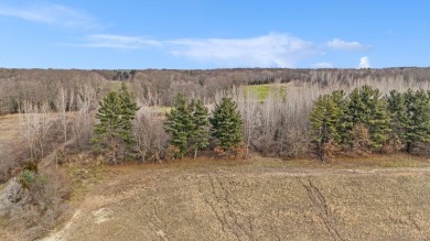 The Fairway Lodge at the Estates of Pine Glen in Saugatuck is a on Ravines Golf Club in Michigan - for sale on GolfHomes.com, golf home, golf lot