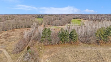 The Fairway Lodge at the Estates of Pine Glen in Saugatuck is a on Ravines Golf Club in Michigan - for sale on GolfHomes.com, golf home, golf lot