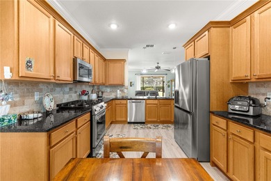 LOCATION-LOCATION-LOCATION - BACKS TO FARM/GREEN SPACE! Spacious on Candler Hills Golf and Country Club in Florida - for sale on GolfHomes.com, golf home, golf lot