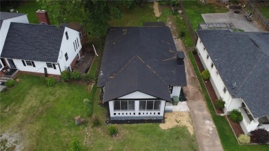 Walk in and welcome home to this Beautifully Renovated Bungalow on Alfred Tup Holmes Golf Course in Georgia - for sale on GolfHomes.com, golf home, golf lot