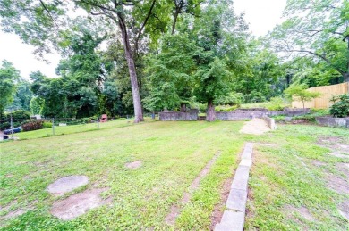 Walk in and welcome home to this Beautifully Renovated Bungalow on Alfred Tup Holmes Golf Course in Georgia - for sale on GolfHomes.com, golf home, golf lot