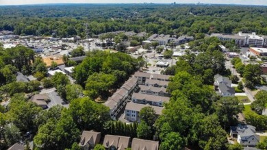 Welcome to this stunning end-unit townhome, perfectly situated on North Fulton Golf Course in Georgia - for sale on GolfHomes.com, golf home, golf lot