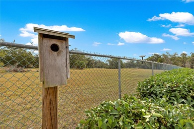 LOCATION-LOCATION-LOCATION - BACKS TO FARM/GREEN SPACE! Spacious on Candler Hills Golf and Country Club in Florida - for sale on GolfHomes.com, golf home, golf lot