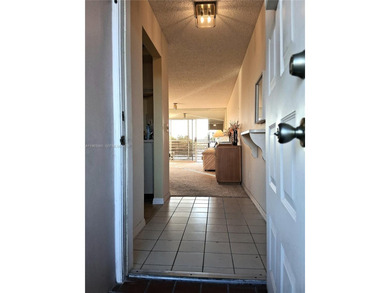 ORIGINAL CONDITION, FULLY FURNISHED 2/2 2nd Floor Inside Corner on Sunrise Lakes Phase IV Golf Course in Florida - for sale on GolfHomes.com, golf home, golf lot