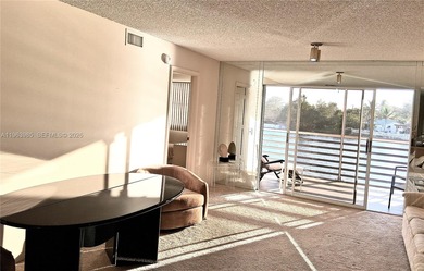 ORIGINAL CONDITION, FULLY FURNISHED 2/2 2nd Floor Inside Corner on Sunrise Lakes Phase IV Golf Course in Florida - for sale on GolfHomes.com, golf home, golf lot