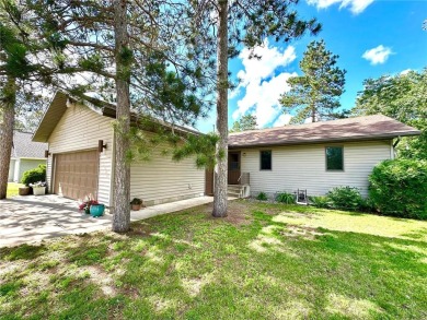 This impressive 3-bedroom, 2-bathroom home proudly overlooks the on Headwaters Country Club in Minnesota - for sale on GolfHomes.com, golf home, golf lot