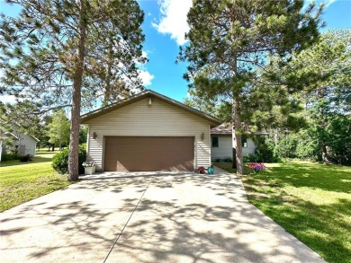 This impressive 3-bedroom, 2-bathroom home proudly overlooks the on Headwaters Country Club in Minnesota - for sale on GolfHomes.com, golf home, golf lot