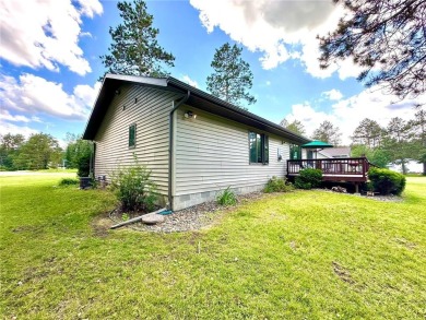 This impressive 3-bedroom, 2-bathroom home proudly overlooks the on Headwaters Country Club in Minnesota - for sale on GolfHomes.com, golf home, golf lot