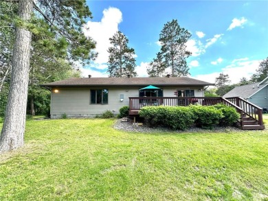 This impressive 3-bedroom, 2-bathroom home proudly overlooks the on Headwaters Country Club in Minnesota - for sale on GolfHomes.com, golf home, golf lot