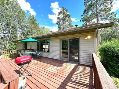 This impressive 3-bedroom, 2-bathroom home proudly overlooks the on Headwaters Country Club in Minnesota - for sale on GolfHomes.com, golf home, golf lot