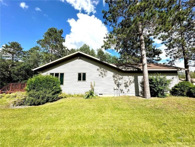 This impressive 3-bedroom, 2-bathroom home proudly overlooks the on Headwaters Country Club in Minnesota - for sale on GolfHomes.com, golf home, golf lot