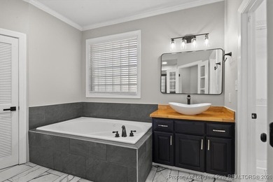 Welcome to this charming home in the highly sought-after golf on Baywood Golf Club in North Carolina - for sale on GolfHomes.com, golf home, golf lot