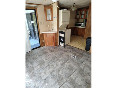 PRICED TO SELL!  Close to everything but far enough away for on Deer Creek RV Golf Resort in Florida - for sale on GolfHomes.com, golf home, golf lot