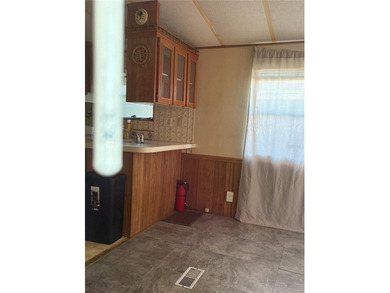 PRICED TO SELL!  Close to everything but far enough away for on Deer Creek RV Golf Resort in Florida - for sale on GolfHomes.com, golf home, golf lot