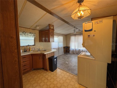 PRICED TO SELL!  Close to everything but far enough away for on Deer Creek RV Golf Resort in Florida - for sale on GolfHomes.com, golf home, golf lot