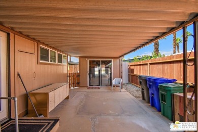 Here's a manufactured home, in a 55+ rent space park that has on Date Palm Country Club in California - for sale on GolfHomes.com, golf home, golf lot