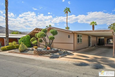 Here's a manufactured home, in a 55+ rent space park that has on Date Palm Country Club in California - for sale on GolfHomes.com, golf home, golf lot