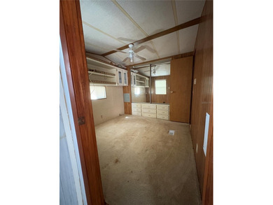 PRICED TO SELL!  Close to everything but far enough away for on Deer Creek RV Golf Resort in Florida - for sale on GolfHomes.com, golf home, golf lot